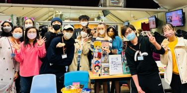   CIE students engage in service learning experience at Christmas market