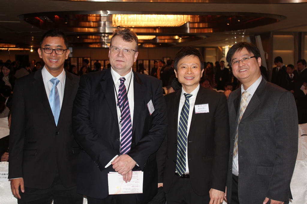 Speakers from various countries have been invited to share their opinions. Prof. Michael Hahn (second from left) of Universitat Bern, Switzerland, is an expert in international economic law.