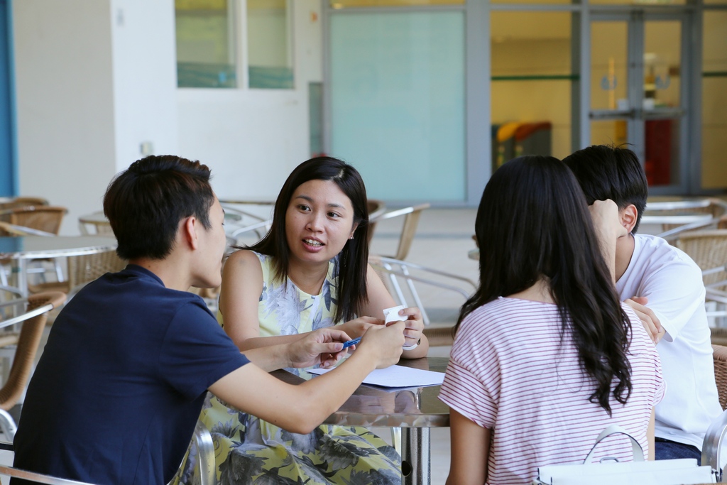 Josephine enjoying quality time with students after class.