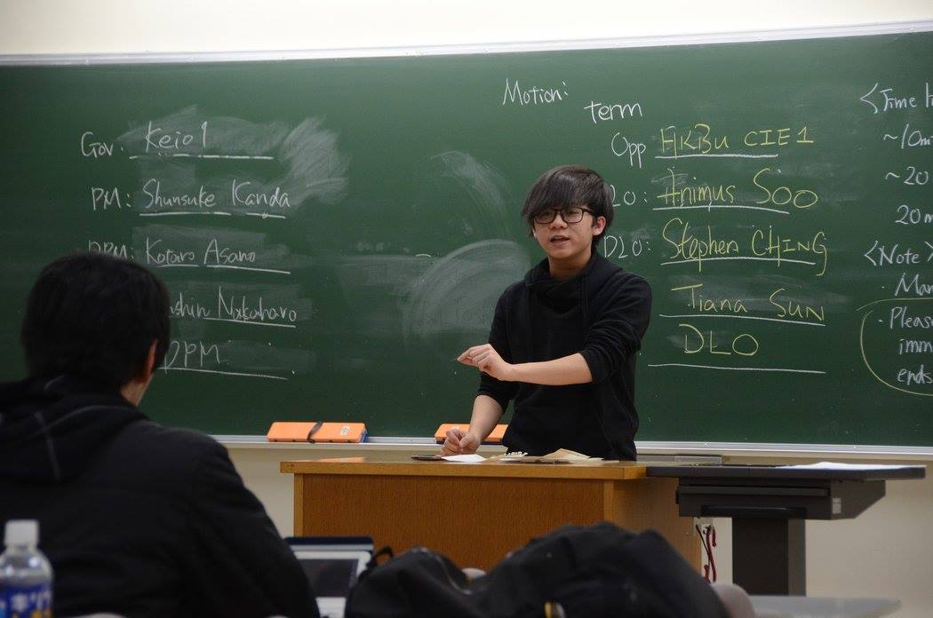 CHING Chi Lok Steven (Year 2, Journalism) was illustrating his views during the tournament.