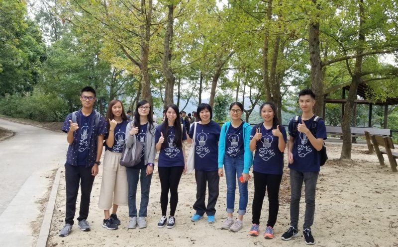 Brian (right) was an outgoing student and enjoyed field trips with his classmates when studied at CIE.